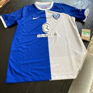 Nike Light Blue and White Jersey with Red Accents